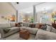 Bright living room with a plush sectional sofa offers ample seating and stylish decor at 9360 Ward Rd, Winston, GA 30187