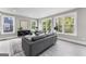 Spacious living room with large windows, comfortable seating, and modern decor at 101 Fairfield Nw Pl, Atlanta, GA 30314