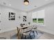 Bright home office featuring a modern desk, stylish chairs, and natural light from the window at 101 Fairfield Nw Pl, Atlanta, GA 30314
