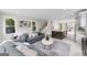 Open-concept living area with kitchen and living room with stairs to other floors at 101 Fairfield Nw Pl, Atlanta, GA 30314