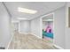 Finished basement showcasing luxury vinyl floors at 116 Alexander Dr, Mcdonough, GA 30252