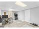 Basement home office with workout area and vinyl flooring at 116 Alexander Dr, Mcdonough, GA 30252