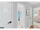 Hallway shot into bathroom; light and neutral paint at 116 Alexander Dr, Mcdonough, GA 30252