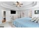 Bedroom featuring a large bed, ceiling fan and neutral paint at 116 Alexander Dr, Mcdonough, GA 30252