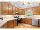 Spacious kitchen with wood cabinets and plenty of countertop space at 116 Alexander Dr, Mcdonough, GA 30252