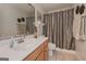 Bathroom showcasing tile flooring, a vanity with ample counter space and stylish neutral accents at 170 Saddleridge Dr, Bremen, GA 30110