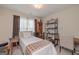 This bedroom features carpet, a single bed with wood trim, and a decorative metal shelf at 170 Saddleridge Dr, Bremen, GA 30110