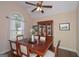 Dining room with hardwood floors and a large window with natural light and dining table at 170 Saddleridge Dr, Bremen, GA 30110