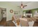 Inviting living room featuring a fireplace, mantel, plush seating, and cozy ambiance at 170 Saddleridge Dr, Bremen, GA 30110