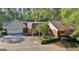 Aerial view of the house showing the garage and front door at 115 Shoal Creek Dr, Sharpsburg, GA 30277