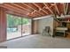 Spacious basement featuring a sliding glass door leading to the backyard, offering natural light and access at 115 Shoal Creek Dr, Sharpsburg, GA 30277