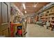 A versatile basement space with tools and equipment, perfect for a workshop or storage at 115 Shoal Creek Dr, Sharpsburg, GA 30277