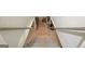 View of basement stairs, railings, and cement walls at 115 Shoal Creek Dr, Sharpsburg, GA 30277