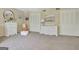 Neutral bedroom with two closets, white furnishings, and neutral walls at 115 Shoal Creek Dr, Sharpsburg, GA 30277