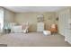 Neutral bedroom with a single bed, white furnishings, and neutral walls at 115 Shoal Creek Dr, Sharpsburg, GA 30277