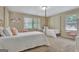 Charming bedroom featuring carpeted floors, natural light and two twin beds with a view of the exterior at 115 Shoal Creek Dr, Sharpsburg, GA 30277