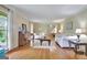 Spacious living room with hardwood floors and neutral tones at 115 Shoal Creek Dr, Sharpsburg, GA 30277