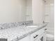Stylish bathroom featuring granite counters, white cabinets, and sleek fixtures at 448 Prescott Way, Villa Rica, GA 30180