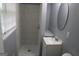 Bathroom featuring toilet, walk-in shower, vanity, sink, and medicine cabinet at 39 Mcferrin Cir, Riverdale, GA 30274