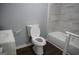 Bright bathroom featuring a toilet, vanity, and tub, offering functionality and style at 39 Mcferrin Cir, Riverdale, GA 30274