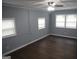 Spacious bedroom with hardwood floors and neutral paint, offering a comfortable and relaxing atmosphere at 39 Mcferrin Cir, Riverdale, GA 30274