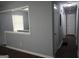 Hallway featuring hardwood floors and neutral paint, leading to other rooms in the home at 39 Mcferrin Cir, Riverdale, GA 30274
