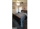 Comfortable bedroom with a plush rug, a ceiling fan, and a painting above the bed at 1270 M L King Jr Sw Dr, Atlanta, GA 30314