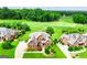 Expansive home with lush landscaping, situated next to a beautifully maintained golf course at 713 Birkdale Blvd, Carrollton, GA 30116