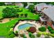 Golf course view from behind landscaped yard with volleyball net at 713 Birkdale Blvd, Carrollton, GA 30116