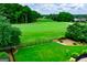 View of neighborhood homes and surrounding area with golf course at 713 Birkdale Blvd, Carrollton, GA 30116