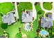 Aerial view of a beautiful estate showcasing a sprawling landscaped lawn and in-ground pool with backyard oasis at 713 Birkdale Blvd, Carrollton, GA 30116