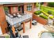 A covered back porch with comfortable seating, ideal for outdoor relaxation at 713 Birkdale Blvd, Carrollton, GA 30116