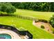 Expansive backyard featuring a lush lawn and a volleyball net at 713 Birkdale Blvd, Carrollton, GA 30116
