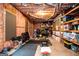 Unfinished basement gym with exposed insulation, wood framing and a large assortment of equipment at 713 Birkdale Blvd, Carrollton, GA 30116