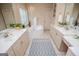 Spacious bathroom with dual sinks, a corner tub, and a walk-in closet at 713 Birkdale Blvd, Carrollton, GA 30116