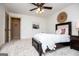 Comfortable bedroom with a ceiling fan, neutral walls, and light-colored carpeting at 713 Birkdale Blvd, Carrollton, GA 30116