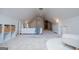 Attic bedroom featuring soft carpet, natural light, and plenty of open space at 713 Birkdale Blvd, Carrollton, GA 30116