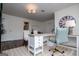 Inviting home office with custom built-ins, neutral decor, and ample natural light for a productive environment at 713 Birkdale Blvd, Carrollton, GA 30116