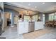 Spacious open kitchen features stainless appliances, recessed lighting, and access to dining area at 713 Birkdale Blvd, Carrollton, GA 30116
