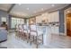 Elegant kitchen island with barstool seating and pendant lighting provides a focal point at 713 Birkdale Blvd, Carrollton, GA 30116