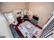 Aerial view of the living room featuring soaring ceilings, fireplace and piano at 713 Birkdale Blvd, Carrollton, GA 30116