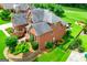 Expansive backyard featuring a large deck, landscaped yard, and surrounding privacy fence at 713 Birkdale Blvd, Carrollton, GA 30116