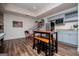 Finished basement offering a kitchen area, custom lighting and a basketball game, perfect for relaxing with friends at 713 Birkdale Blvd, Carrollton, GA 30116