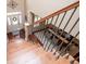 View from the top of the staircase looking towards the front entrance and dining room at 713 Birkdale Blvd, Carrollton, GA 30116