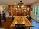 Dining area with a large wood table perfect for Gathering gatherings at 360 Morgan Mill Rd, Brooks, GA 30205
