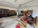 Spacious garage with organized storage and workshop areas at 360 Morgan Mill Rd, Brooks, GA 30205