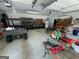 Well-equipped garage featuring multiple tools and vehicle at 360 Morgan Mill Rd, Brooks, GA 30205