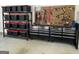 Functional garage space with storage shelves, toolbox, and convenient organization at 360 Morgan Mill Rd, Brooks, GA 30205