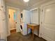 Functional laundry area with stacked washer and dryer and storage at 360 Morgan Mill Rd, Brooks, GA 30205