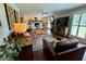 Spacious living room with hardwood floors, natural light, and comfortable seating at 360 Morgan Mill Rd, Brooks, GA 30205